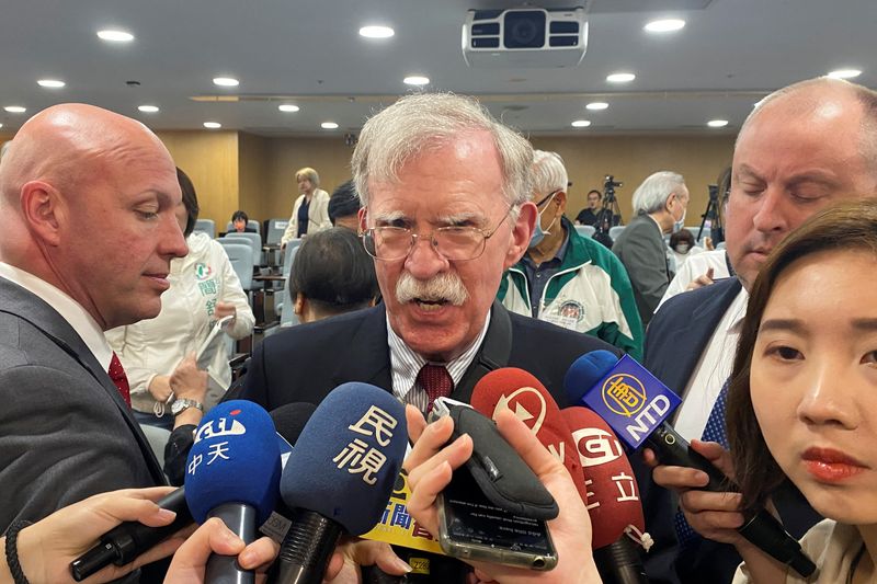 John Bolton speaks to journalists at a forum in Taipei