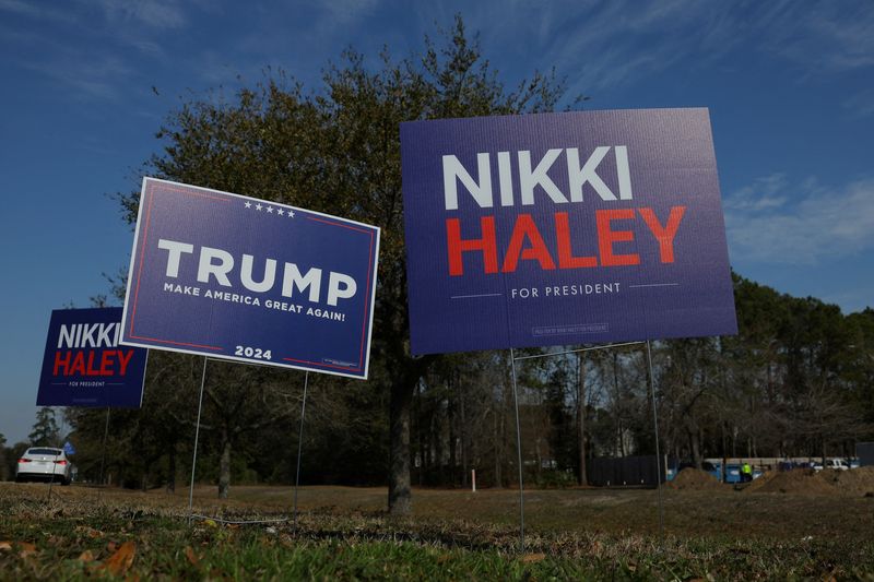 FILE PHOTO: Campaign signs for Republican presidential candidates stand in Mount Pleasant, SC